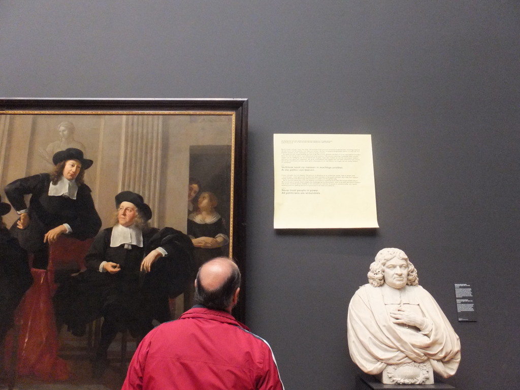 Links: 'De regenten van het Spinhuis en Nieuwe Werkhuis te Amsterdam' van Karel Dujardin, 1669. Voor bij de kwaal: 'Vertrouw nooit op mensen in machtige posities. Al die politici zijn boeven.'